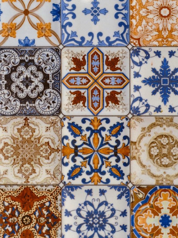 Old tiles mosaic, background from home colorful decorative art tiles, pattern in oriental style background design. Idea for decoration of space or wallpaper for advertising